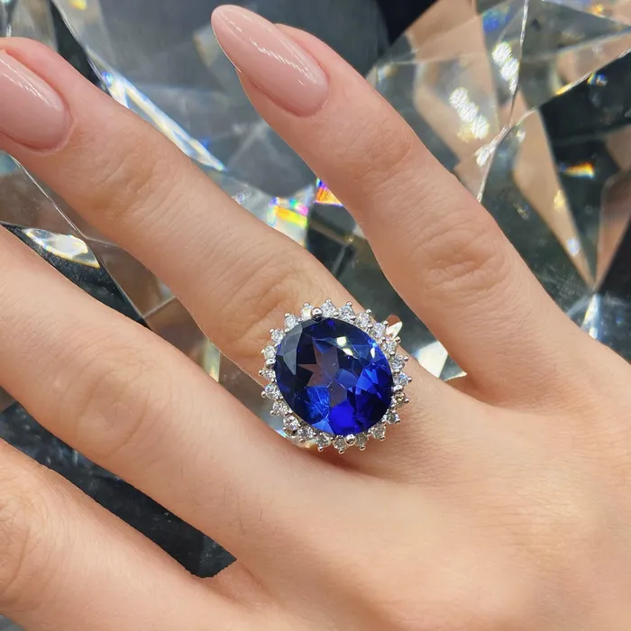 Diamond Source NYC Rings Diffused Oval Shape Blue Sapphire Cocktail Diamond Ring Set in 14K White Gold 850ct tw